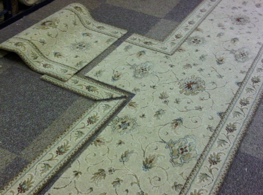 Border is cut and mitred ready to be seamed onto the broadloom